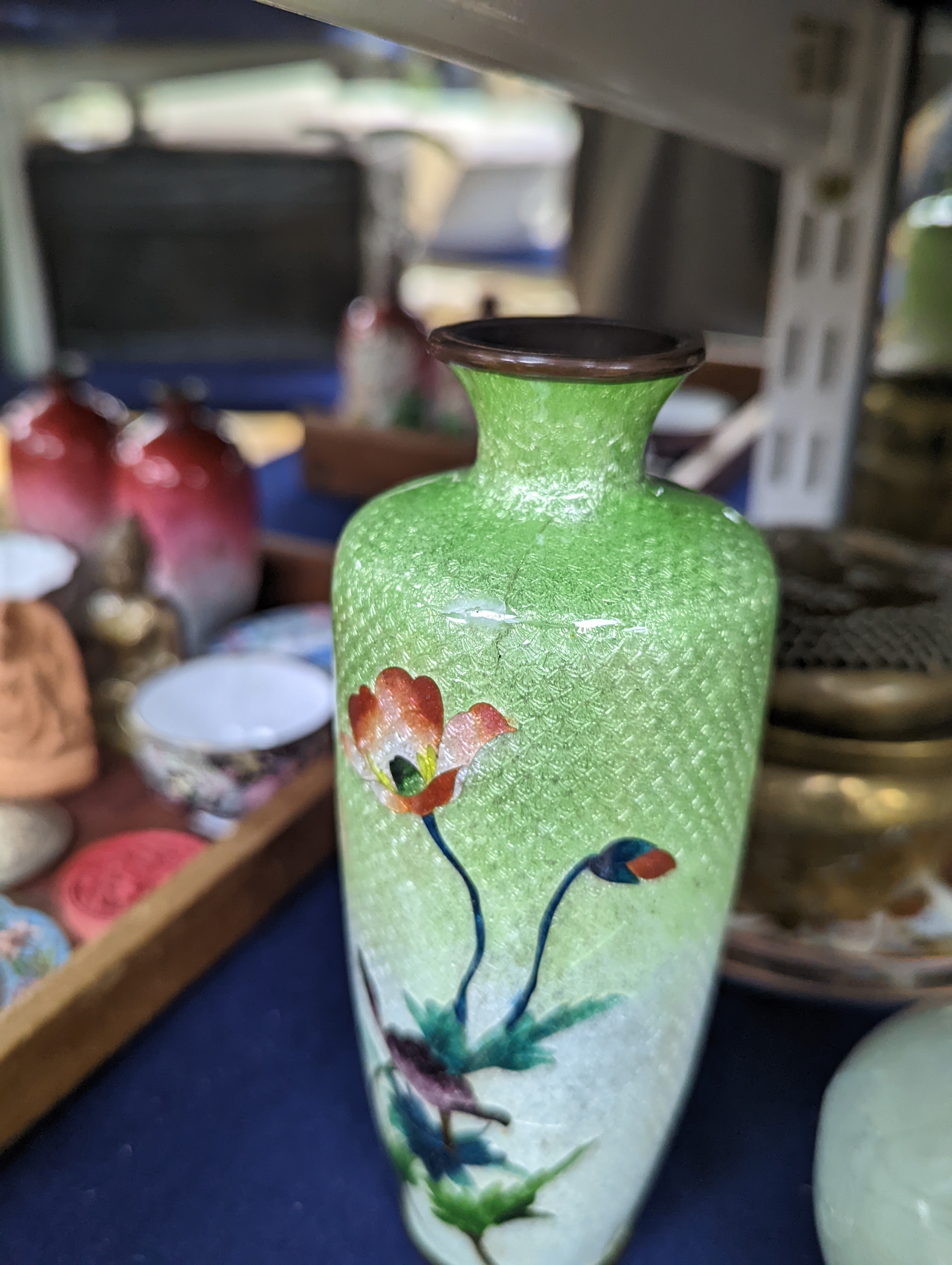 A bronze hand warmer with Xuande mark, 10 cm wide and two Himalayan Buddhist figures, two 18th century Chinese Canton enamel cups, and a 19th century Canton enamel oval snuff box, Four Japanese cloisonné enamel vases (th
